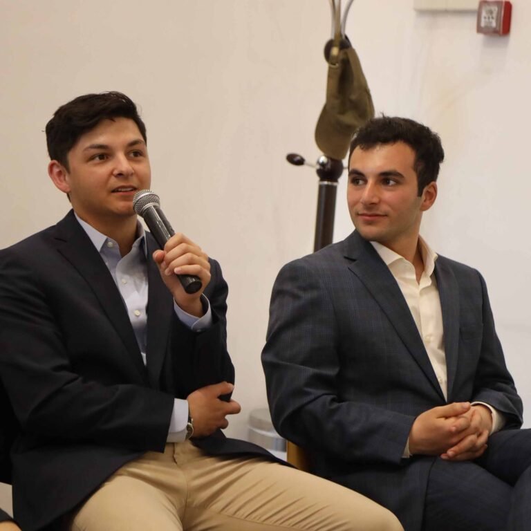 Hrachya Sahakyan and an Earth Day organization representative speaking at a seminar at the American University of Armenia in Yerevan, 2024